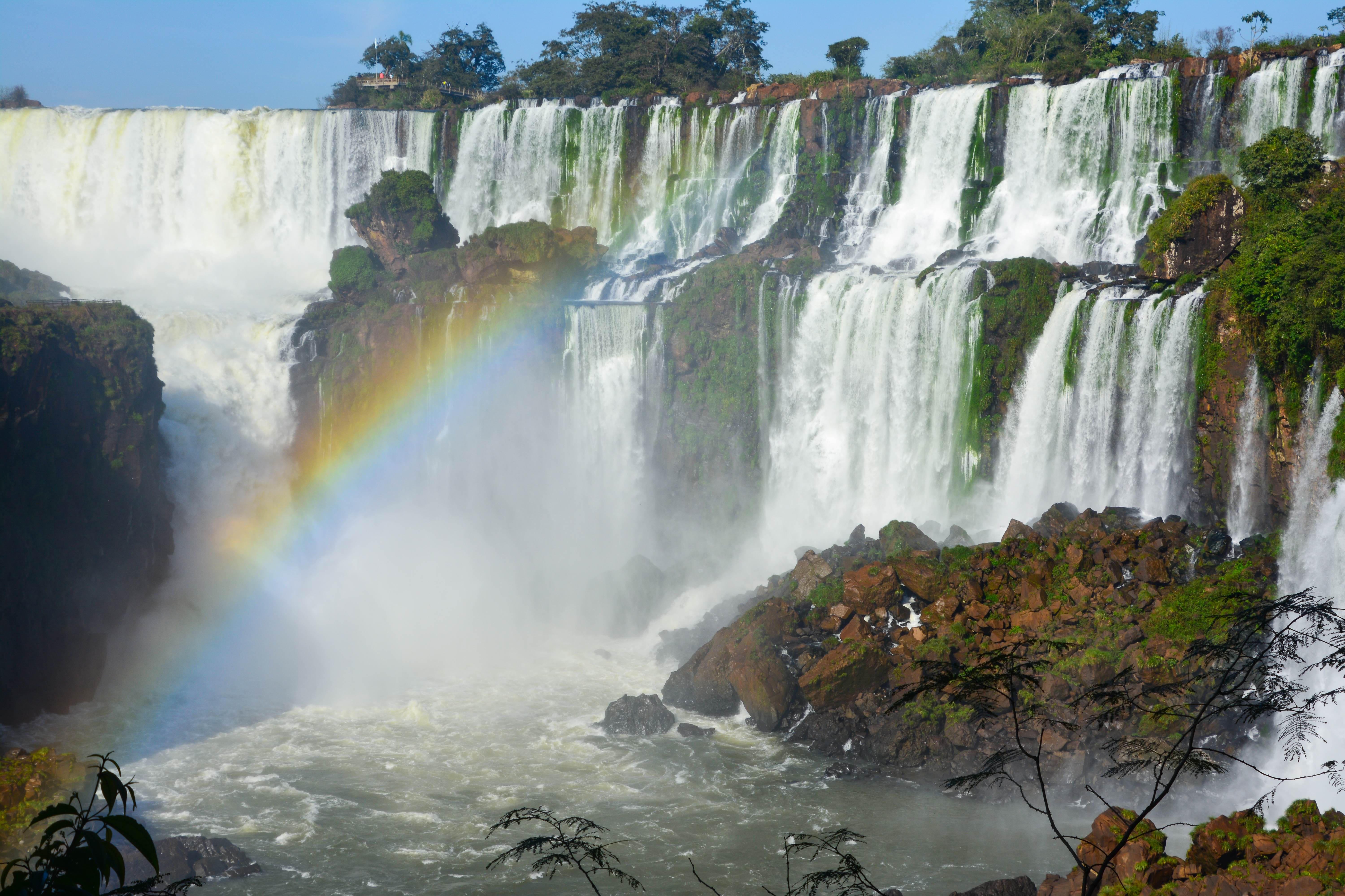 Rainbow visible at lower circuit of Iguazu Falls in Argentina